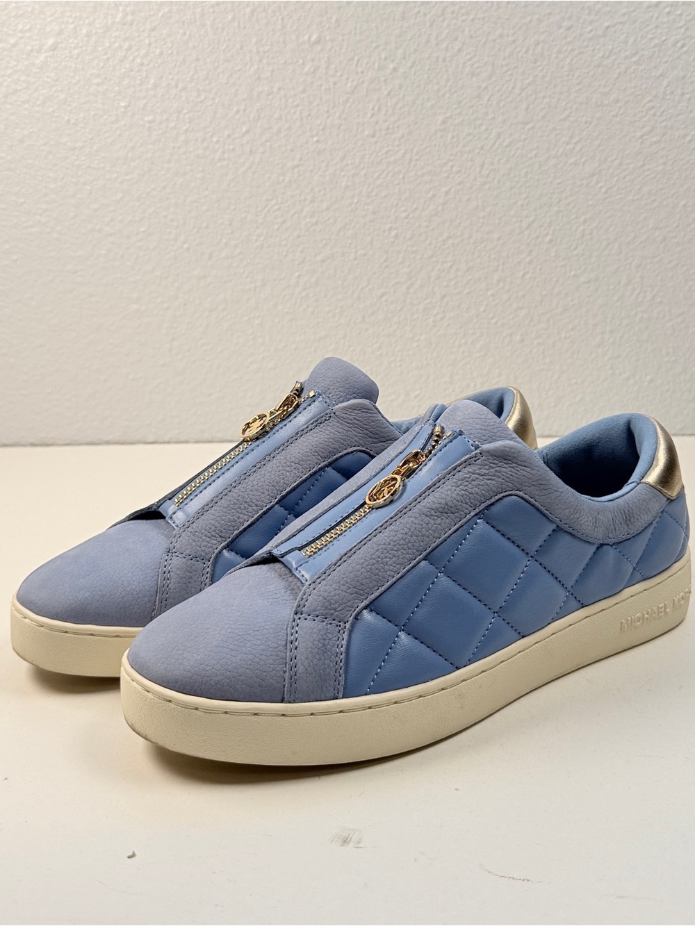 Michael Kors Keaton Zip Slip On Sneakers Light Blue Quilted Gold Logo Womens 9.5